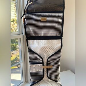 Skip Hop baby changing station and diaper clutch